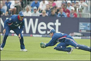 England's Chris Read makes a diving catch