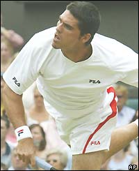 Mark Philippoussis serves