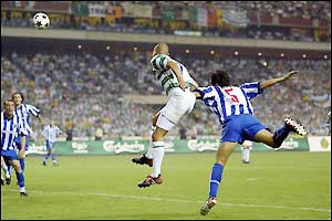 Larsson leaps above Ricardo Costa to score Celtic's equaliser