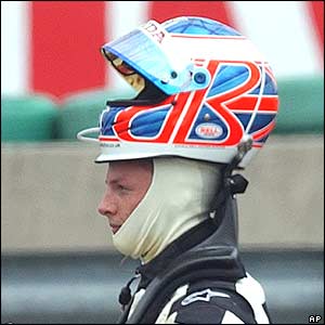 Jenson Button walks away from his BAR car