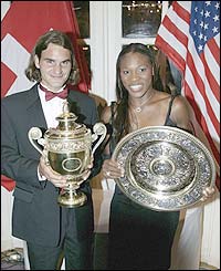 Federer and Serena Williams pose with their trophies
