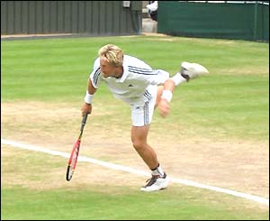 Jonas Bjorkmann serves