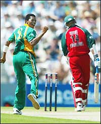 Makhaya Ntini celebrates his fourth scalp - Sean Ervine