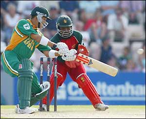 Jacques Rudolph gets on top of the Zimbabwe bowling