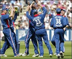England players celebrate the wicket of Morne van Wyk