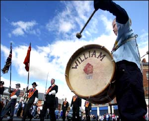 Four-year-old William Douglas plays a miniature lambeg drum