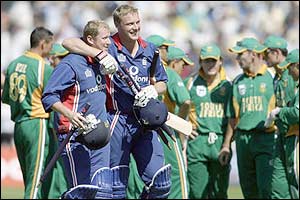 Anthony McGrath and Andrew Flintoff celebrate England's win