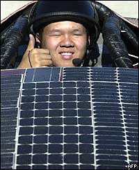 Driver gives a thumbs-up before the race starts