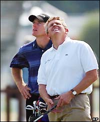 Colin Montgomerie looks skyward during practice