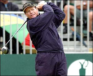 Tom Watson hits his tee-shot on the first