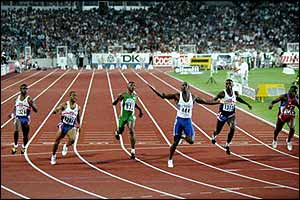 Linford Christie wins the men's 100m