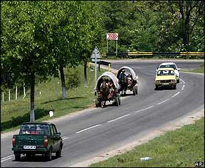Wagons on the road - with cars overtaking