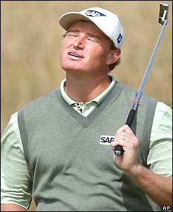 Ernie Els reacts after missing a putt