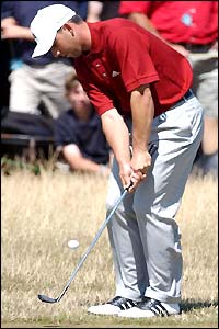 Sergio Garcia chips onto the green