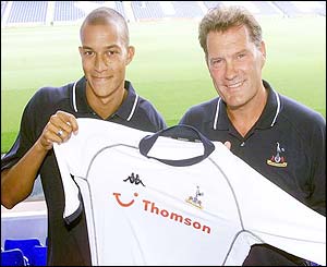 Tottenham's Bobby Zamora and Glenn Hoddle hold a Spurs shirt