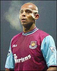 Man City midfielder Trevor Sinclair in action for West Ham