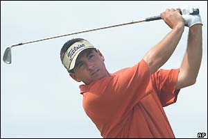 Ben Curtis hits a shot from the tee