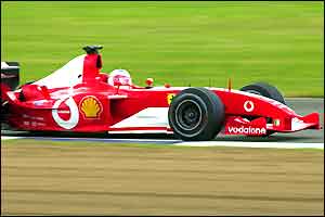 Rubens Barrichello roars into the lead at the British Grand Prix