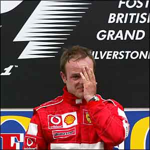 Rubens Barrichello shows his emotions on the podium