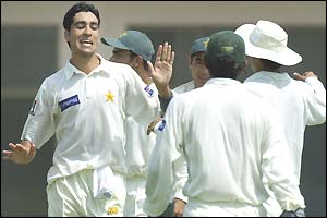 Pakistan bowler Umar Gul celebrates one of his three wickets on the first day