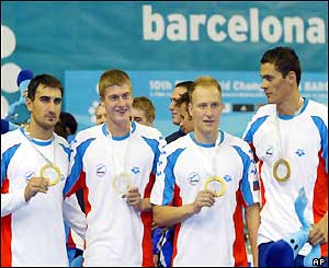 Andrei Kapralov, Ivan Usov, Denis Pimankov and Alexander Popov hold up their gold medals
