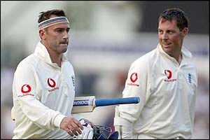 England's Graham Thorpe and Marcus Trescothick walk off the pitch at the end of play