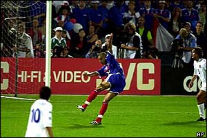 David Trezeguet scores the golden goal from Robert Pires' cross