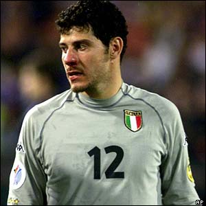Italy goalkeeper Francesco Toldo walks off the pitch in dejection