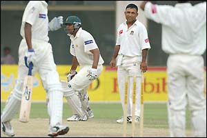 Bangladesh skipper Mahmud looks on in dismay as Inzamam hits the winning runs for Pakistan