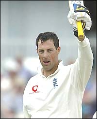 Marcus Trescothick raises his bat to acknowledge his fourth Test hundred