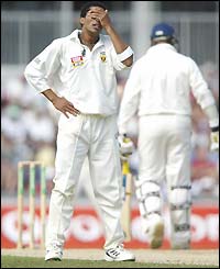 Makhaya Ntini holds his head in frustration