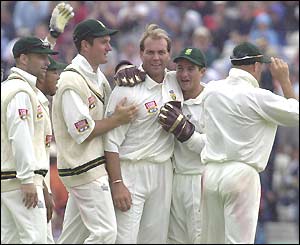 Jacques Kallis (centre) is mobbed by his team-mates after dismissing Graham Thorpe