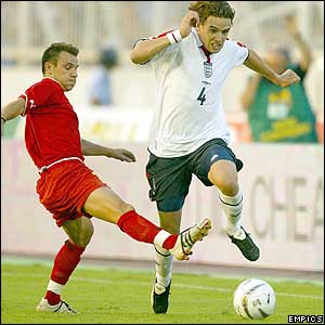 England's Owen Hargreaves goes past Macedonia's Vanco Trajanov 