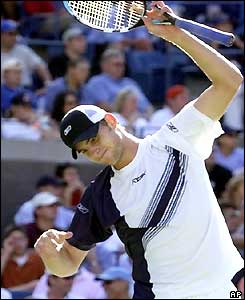 Andy Roddick reacts after losing a point