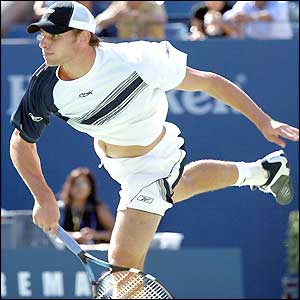 Andy Roddick serves during the semi-final