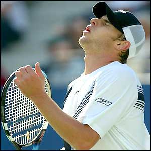 Andy Roddick looks to the heavens after narrowly winning the third set