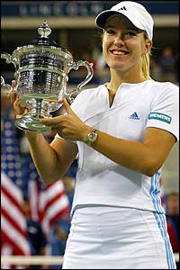 Henin-Hardenne collects the trophy and a cheque for US$1m