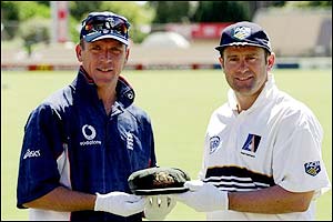 Alec Stewart and Australia captain Mark Taylor hold a 1948 Australian cap the before the Third Ashes Test