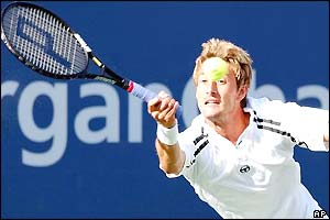 Juan Carlos Ferrero stretches for a return