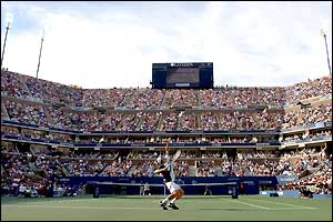 Andy Roddick serves at the Arthur Ashe stadium