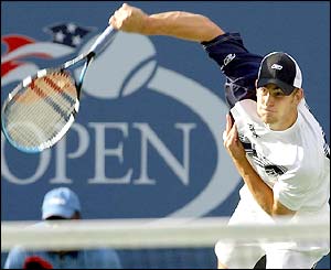 Andy Roddick serves