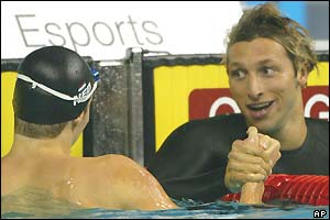 Pieter van den Hoogenband shakes hands with Ian Thorpe after the Australian beats him in the 200m freestyle