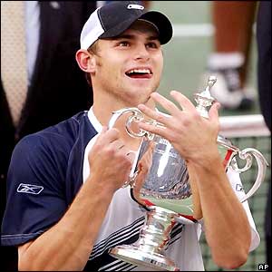 Andy Roddick hugs the US Open trophy