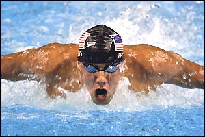 Michael Phelps swims on his way to winning 200m butterfly gold