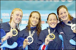 USA team members Rhiannon Jeffrey, Rachel Komisarz, Diana Munz and Lindsay Benko on the podium with their gold medals 