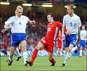 Simon Davies scores Wales' opener