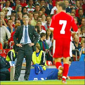 Wales boss Mark Hughes looks on as Jason Koumas is dismissed