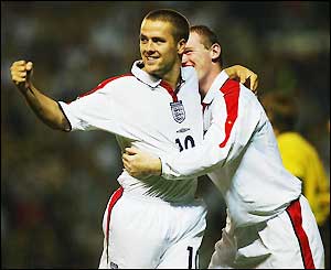 Owen celebrates his opening goal