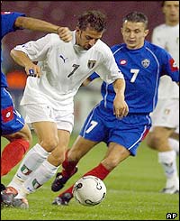 Italy's Alessandro del Piero rides a tackle