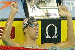 Michael Phelps reacts after setting a new world record in the men's 200m individual medley final 